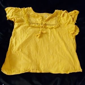 Mustard yellow top.
